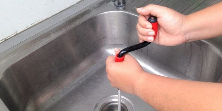 How Do Plumbers Unclog Drains?